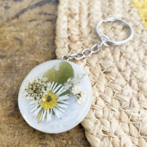 Porte clés en résine avec inscription Merci