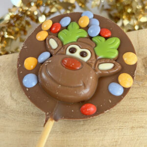 Sucette ronde "Renne de Noël" en chocolat au lait et smarties